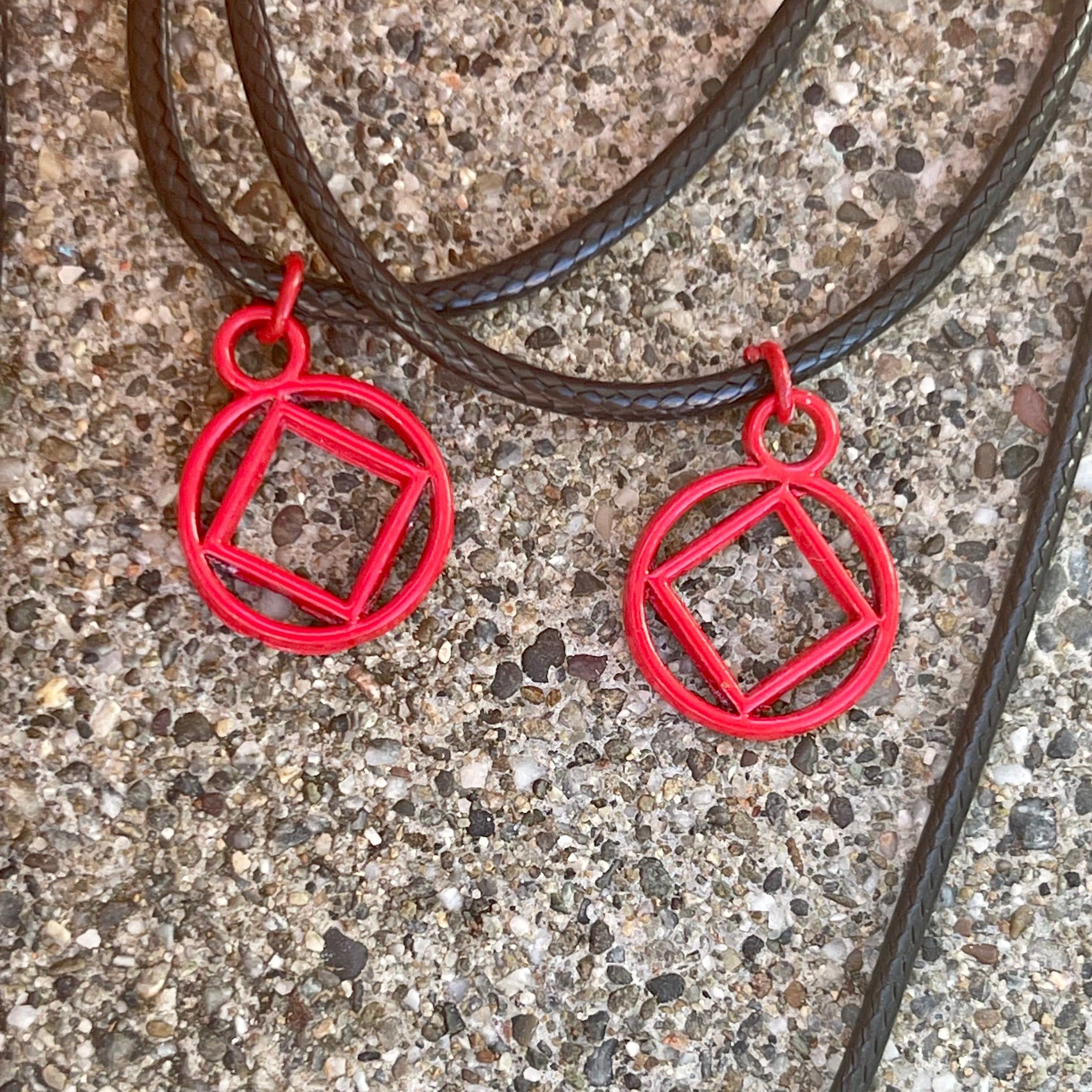 Red Coated NA Charm necklace