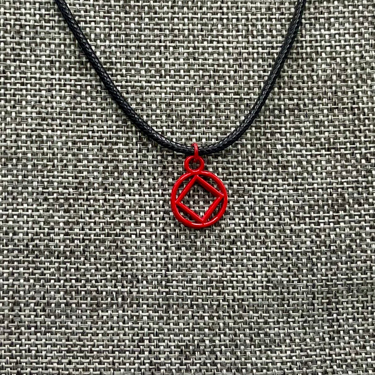 Red Coated NA Charm necklace