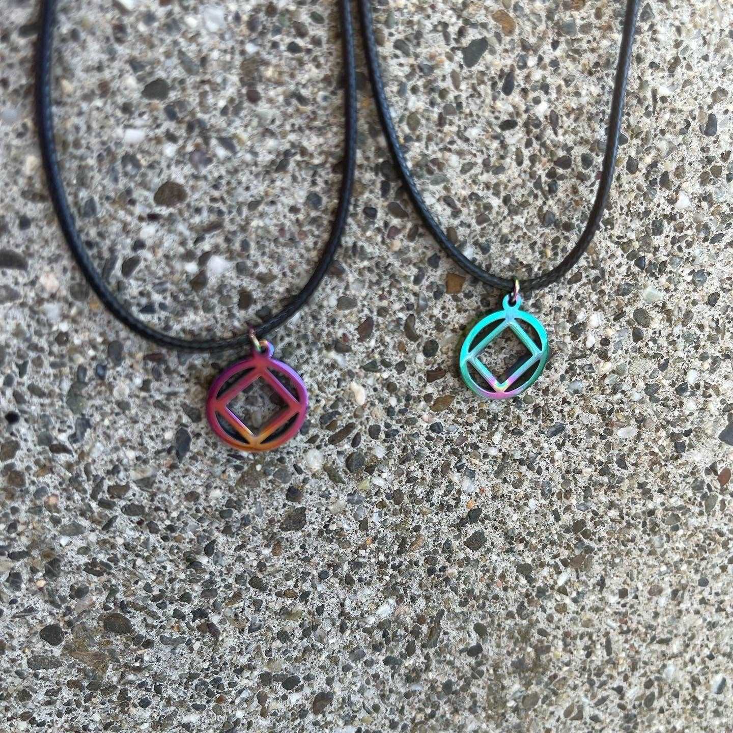 MetalLadyCo NA Charm Necklace featuring two colorful geometric pendants on black cords