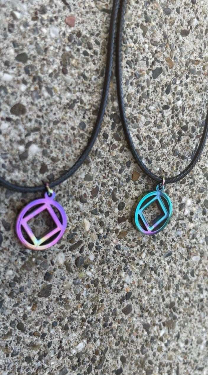 MetalLadyCo NA Charm Necklace with colorful geometric pendant on black cord necklace